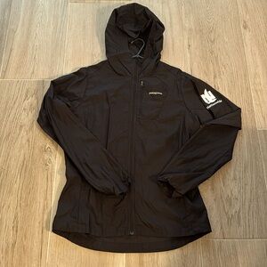 Patagonia Houdini packable windbreaker with hood.